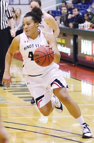 Sean Arbaut/Minot State athletics Minot State's Diondra Denton (44) drives to the basket during a women's college basketball game on Friday at the MSU Dome in Minot.